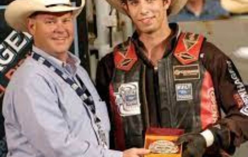 JB Mauney Net Worth – Professional bull rider JB Mauney receiving an award for his outstanding rodeo performance.