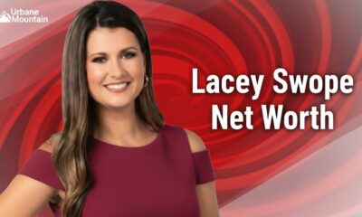 Lacey Swope Net Worth 2025 – News 9 meteorologist smiling in studio with red background, representing her career, success, and biography.